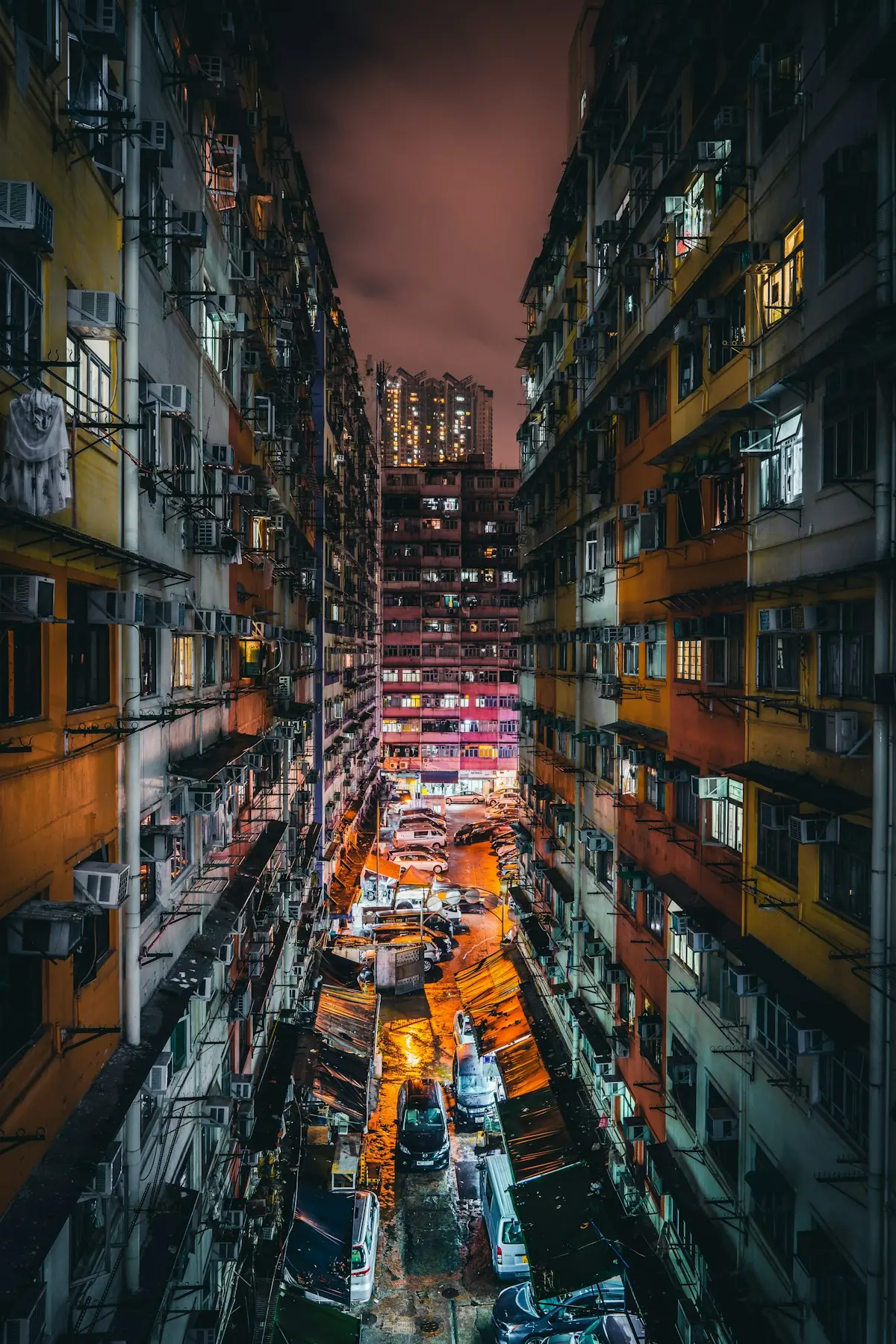 Narrow street between high-rise buildings in Kowloon