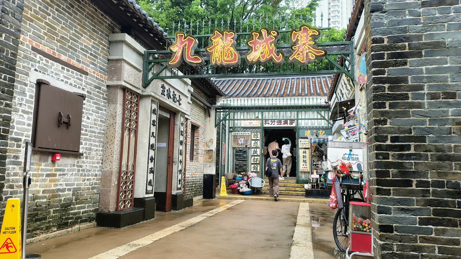 Traditional building in Kowloon with a hand-painted shop sign